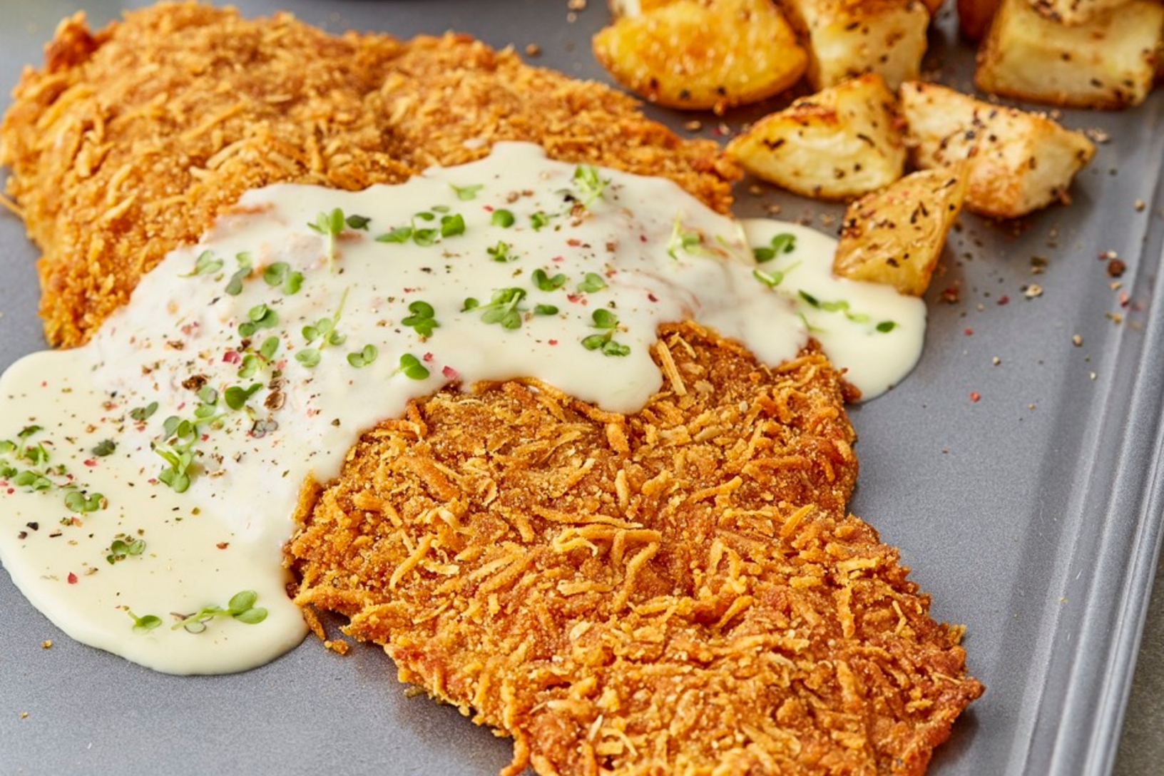 Pescado con patatas fritas “cheesylicious”