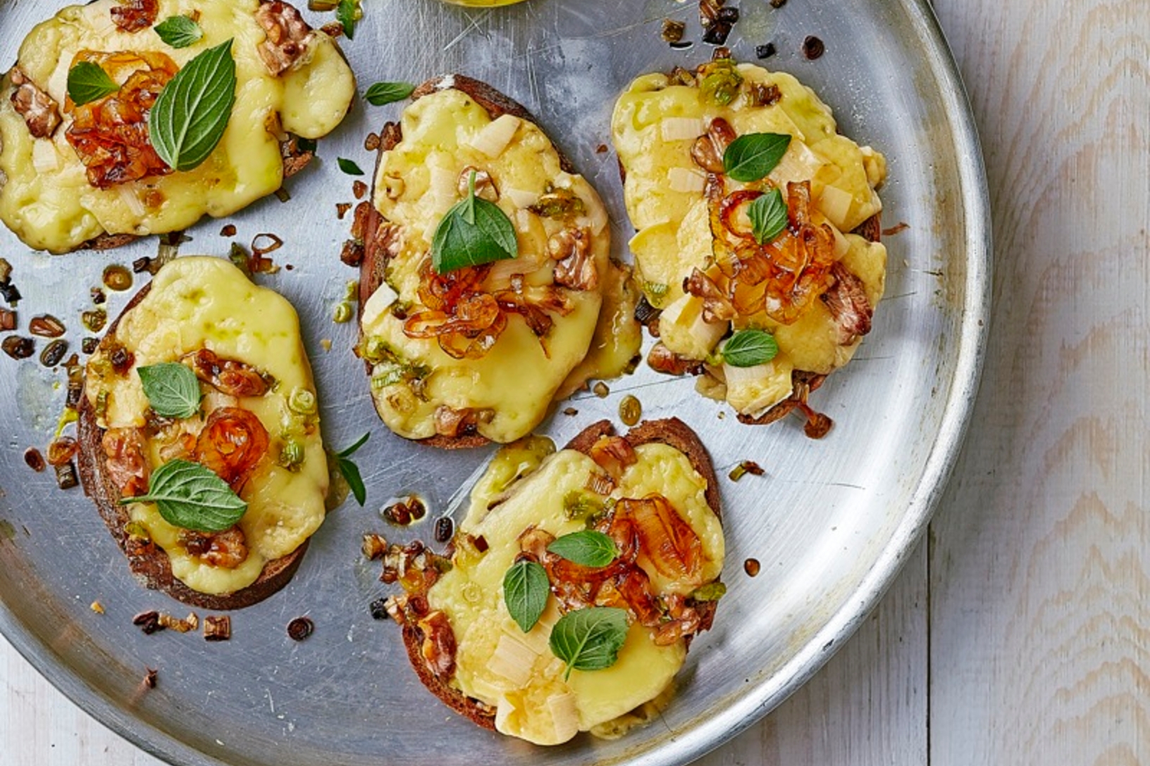 Caramelized onion and gouda cheese crostini